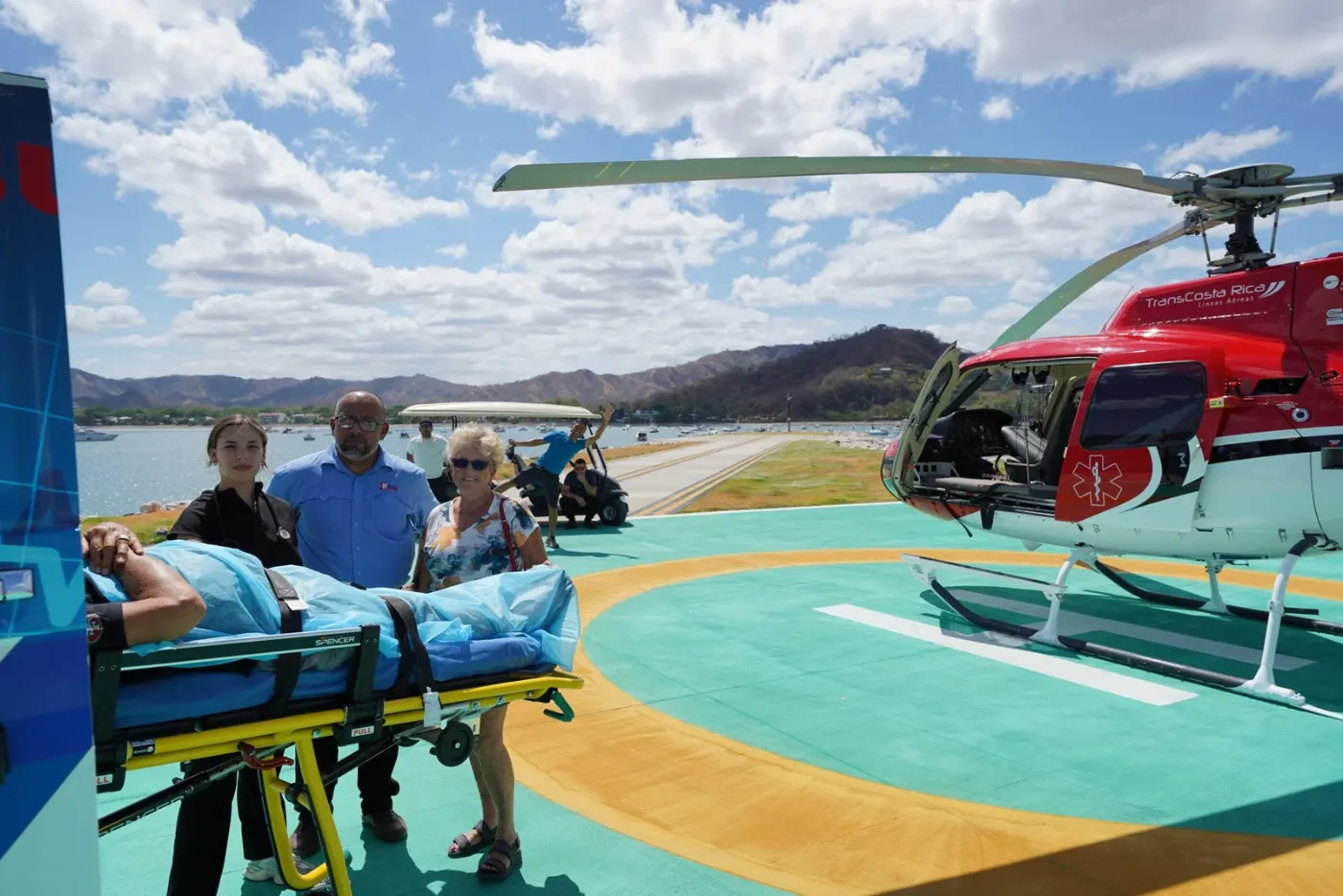 Medi Red air ambulance helicopter with a patient on a stretcher